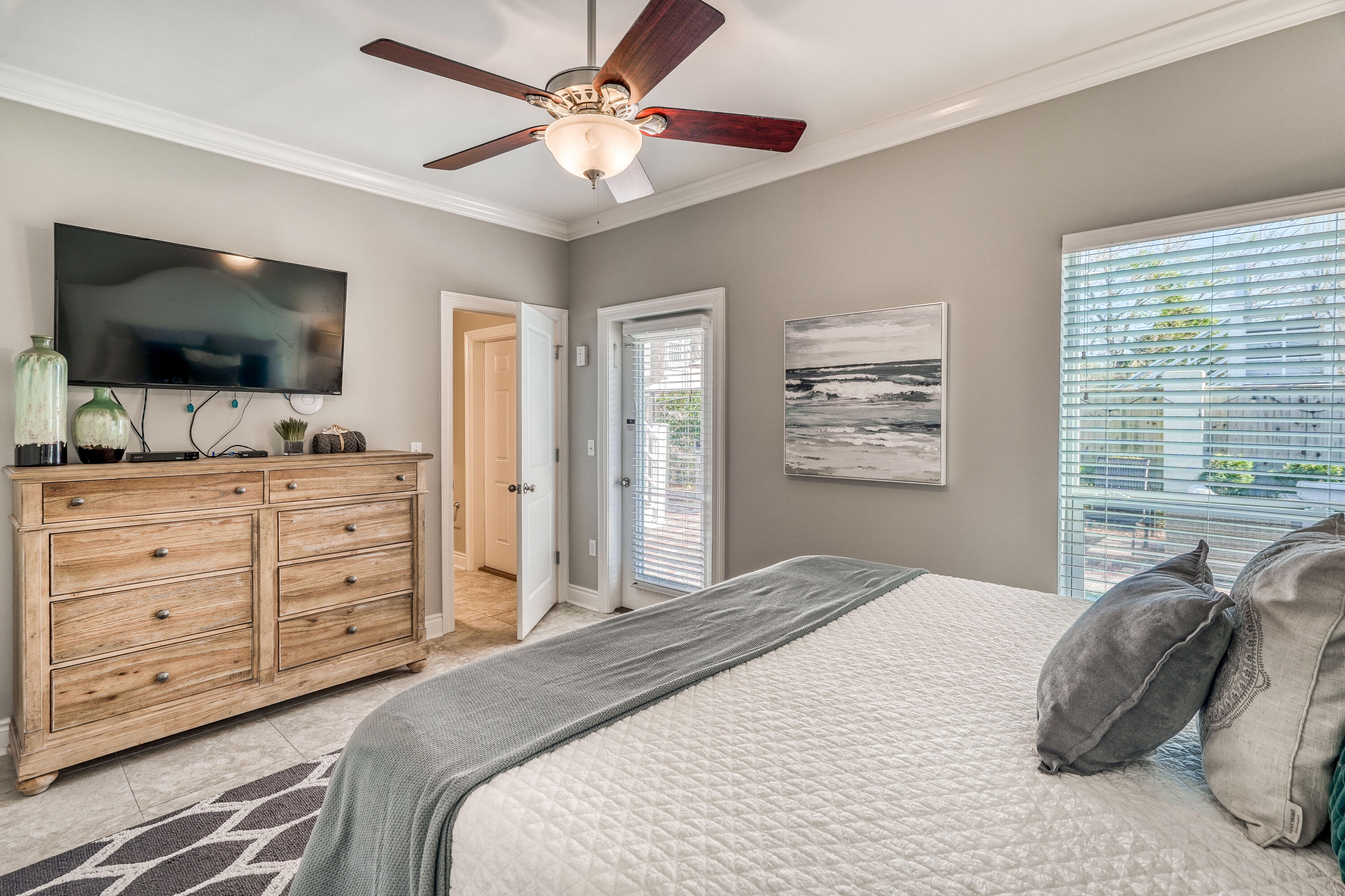 29 Payne Street Miramar Beach, FL 32550 - Photo 32 of 49 a bedroom with a large bed and a flat screen tv