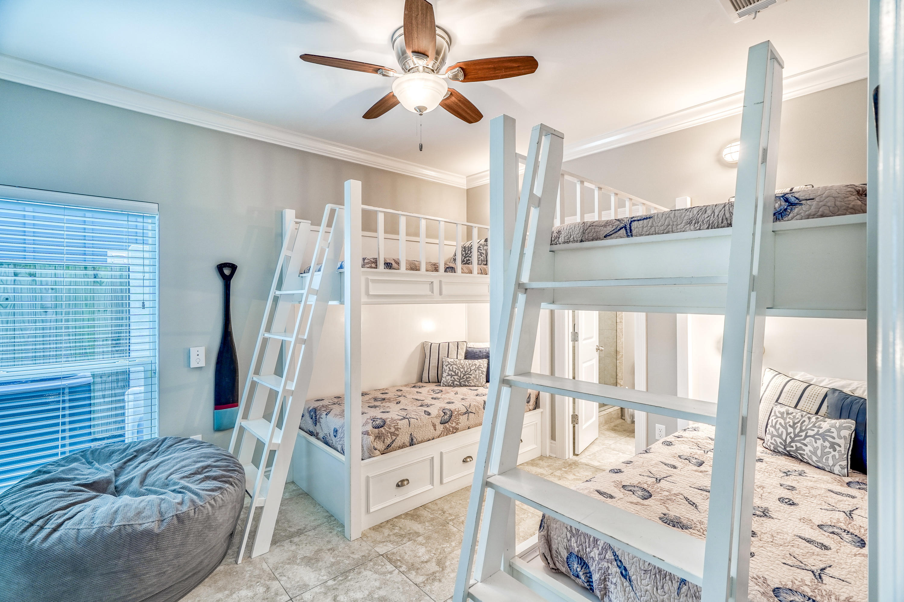 29 Payne Street Miramar Beach, FL 32550 - Photo 35 of 49 a bedroom with furniture and a large window