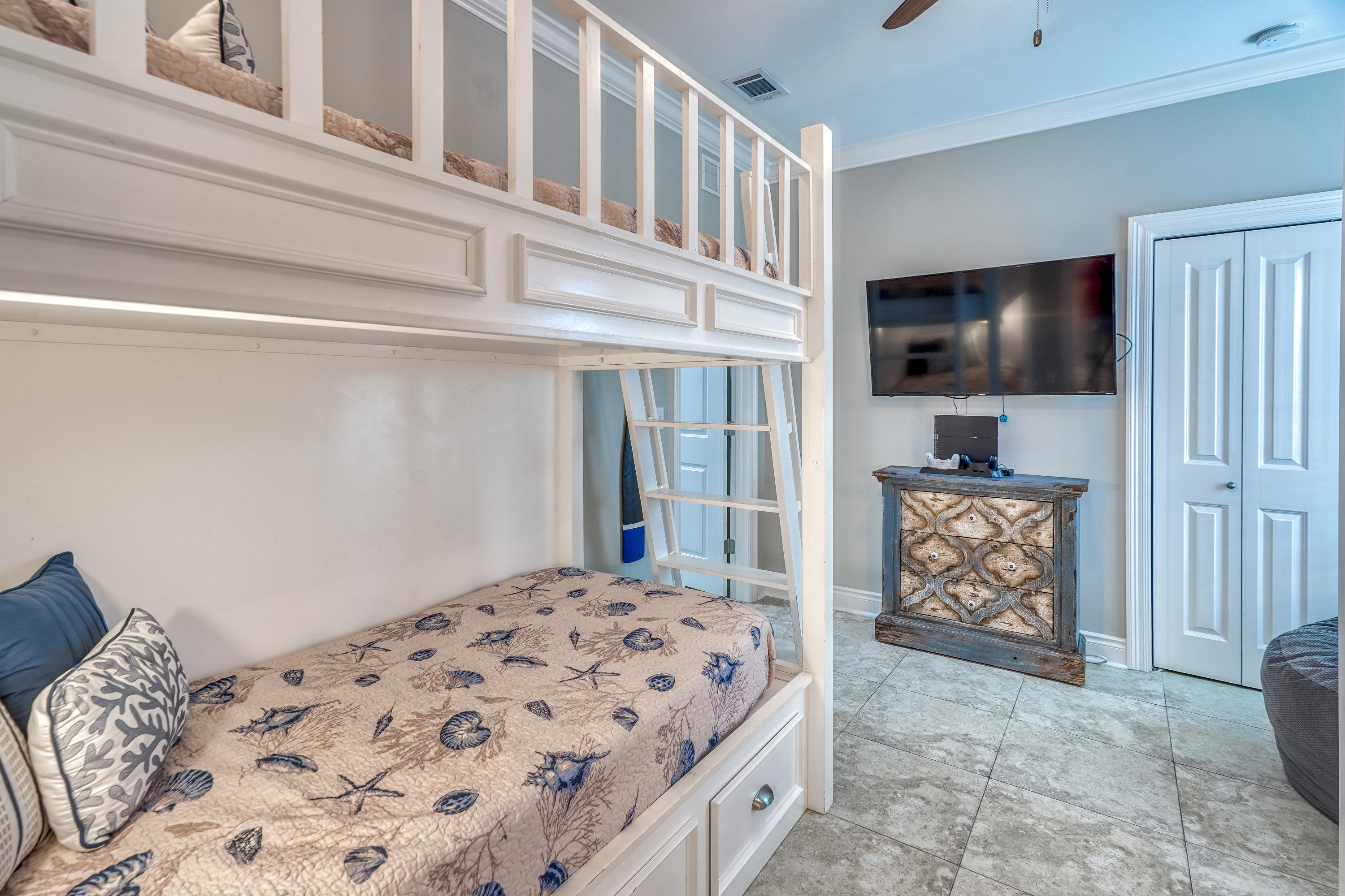 29 Payne Street Miramar Beach, FL 32550 - Photo 36 of 49 a bedroom with a bed and a television