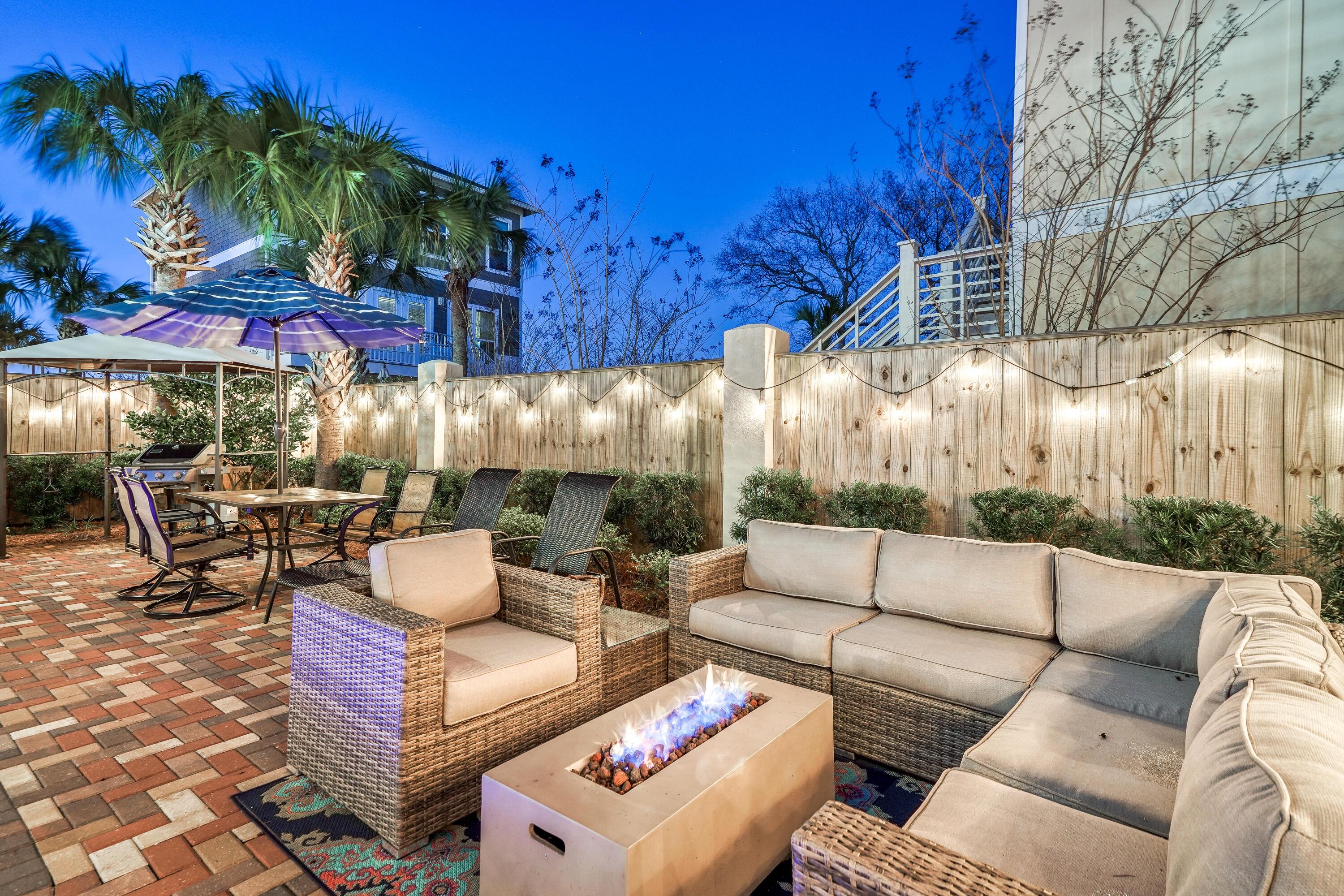 29 Payne Street Miramar Beach, FL 32550 - Photo 5 of 49 a view of a patio with couches and a fire pit