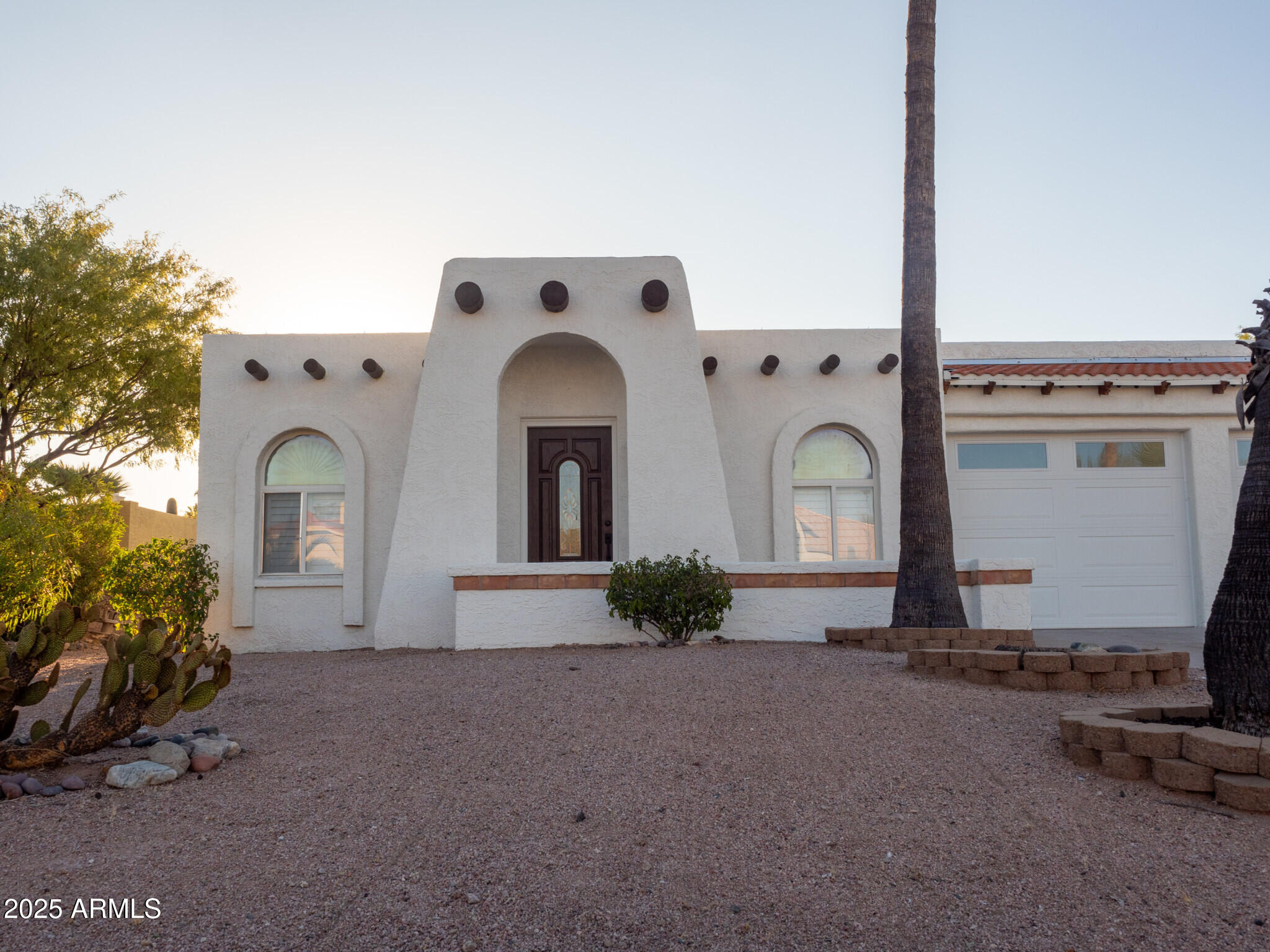 14211 North Fountain Hills Boulevard, Unit B Fountain Hills, AZ 85268 - Photo 1 of 41 a front view of a house with garden