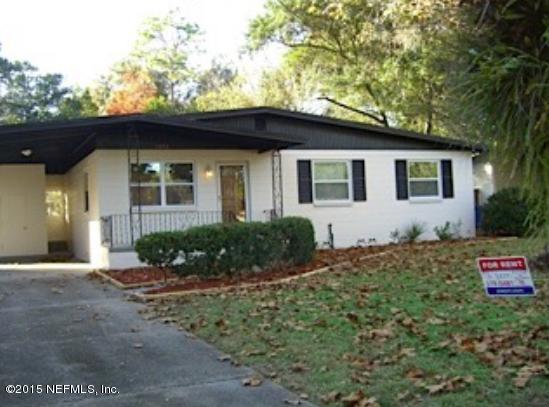 1852 Banbury Road Jacksonville, FL 32211 - Photo 1 of 1 a front view of a house with yard