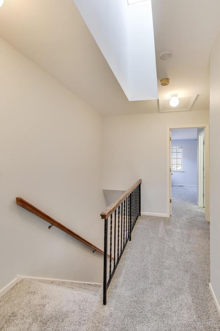 1303 Cranbrook Court Schaumburg, IL 60193 - Photo 9 of 29 a view of a hallway with entryway