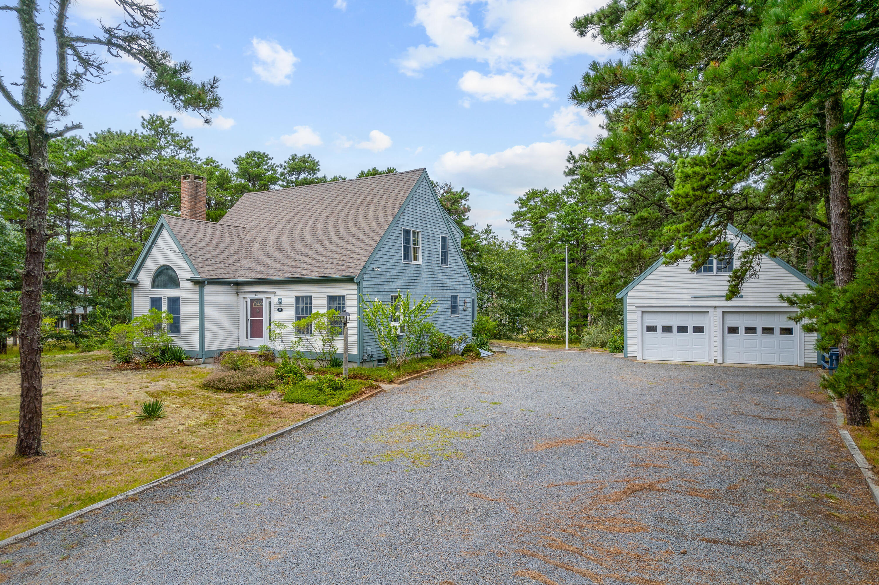 86 Old Wharf Road Wellfleet, MA 02667 - Photo 1 of 37 front view of a house with a street