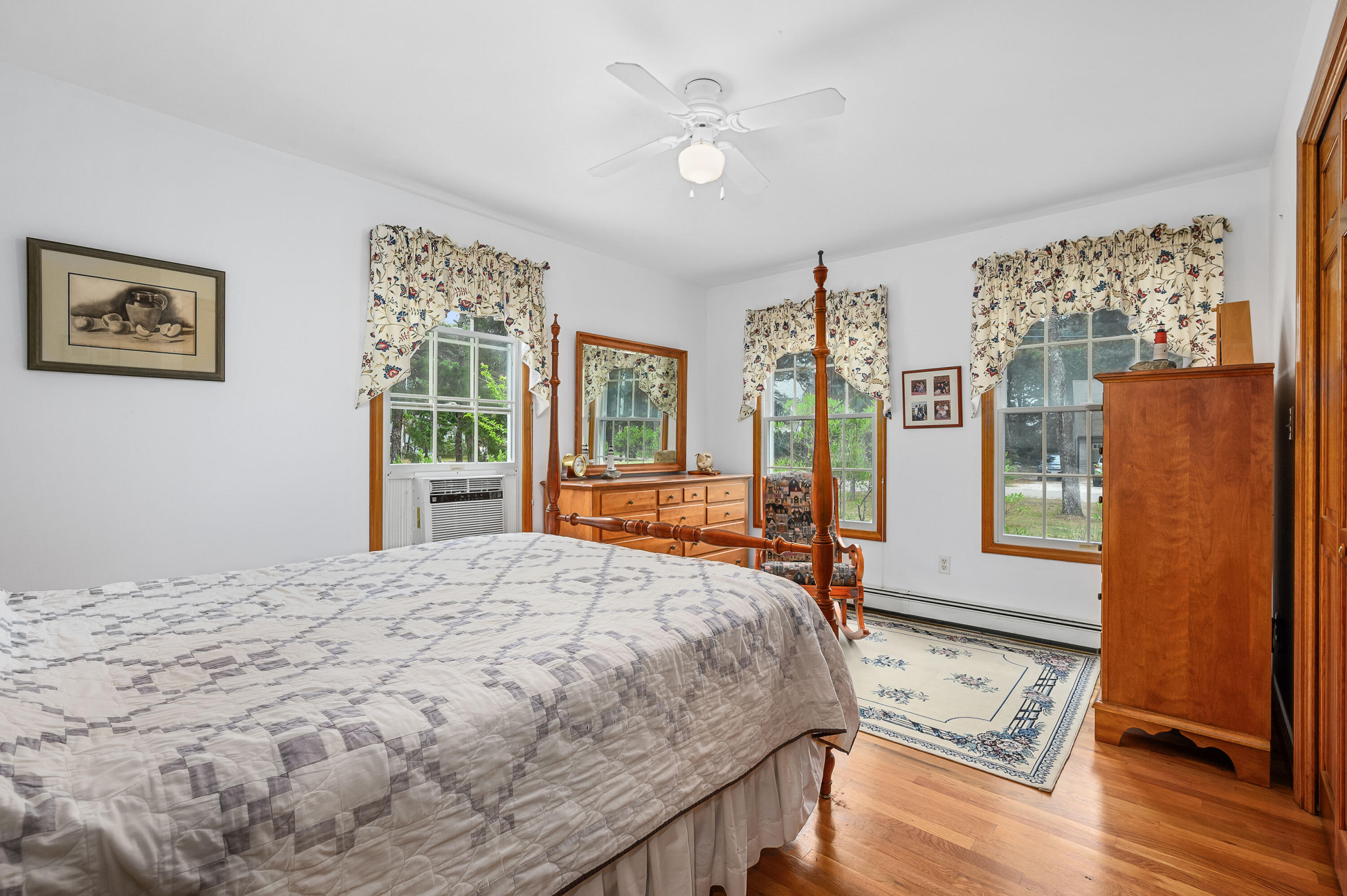 86 Old Wharf Road Wellfleet, MA 02667 - Photo 17 of 37 a bedroom with a large bed and a window