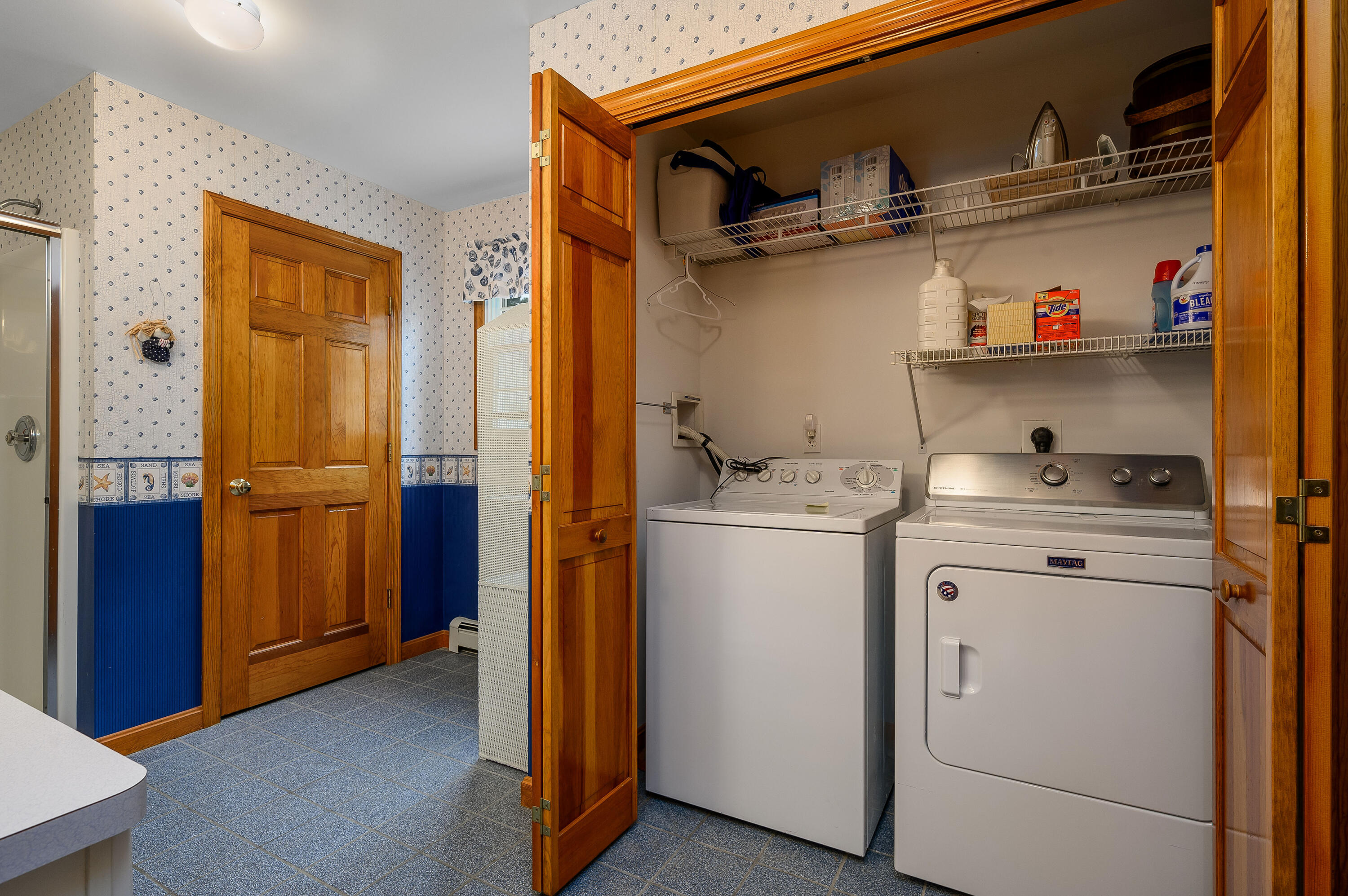 86 Old Wharf Road Wellfleet, MA 02667 - Photo 19 of 37 a view of storage and utility room with washer and dryer