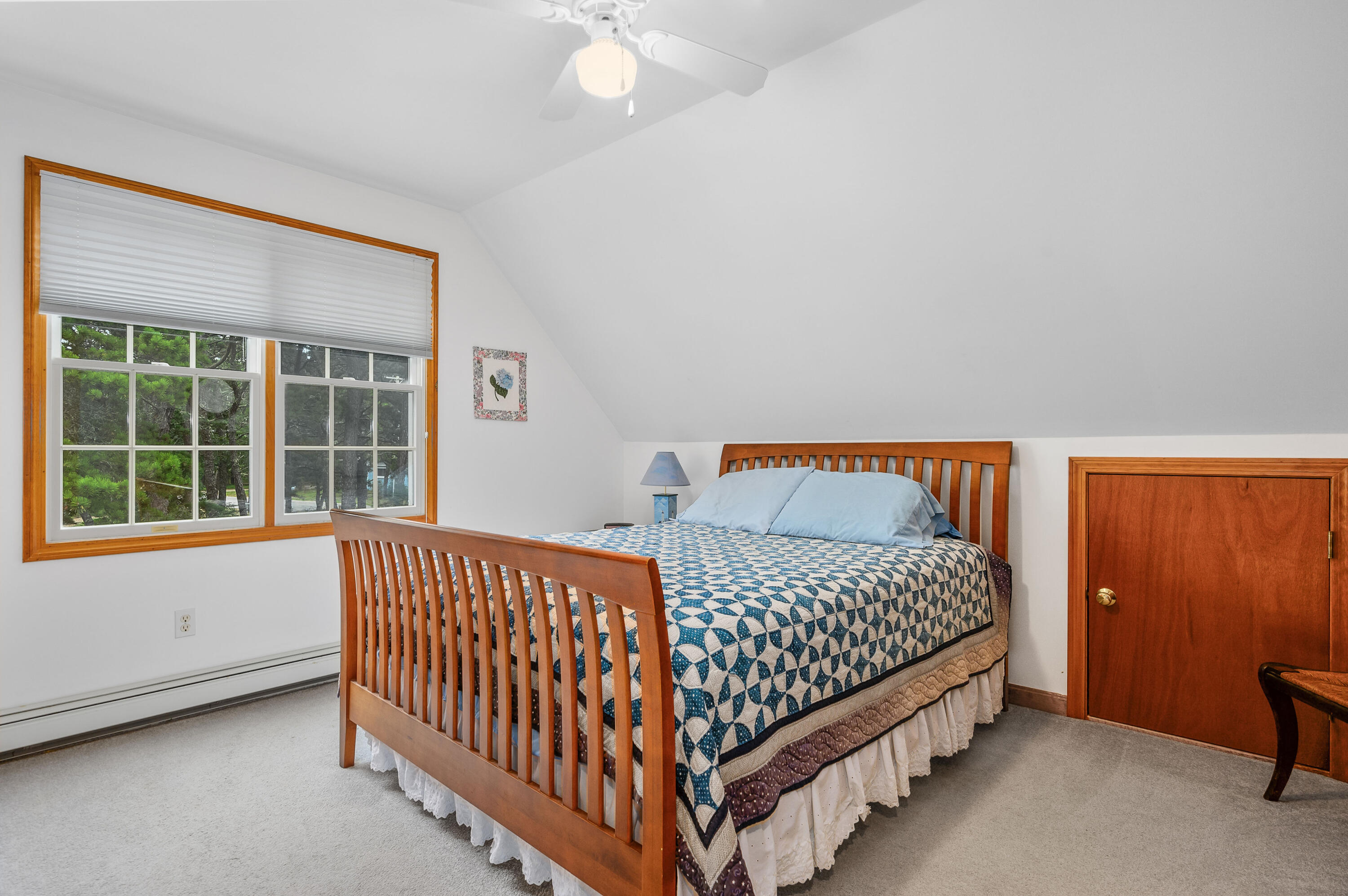 86 Old Wharf Road Wellfleet, MA 02667 - Photo 26 of 37 a bedroom with a bed and a window