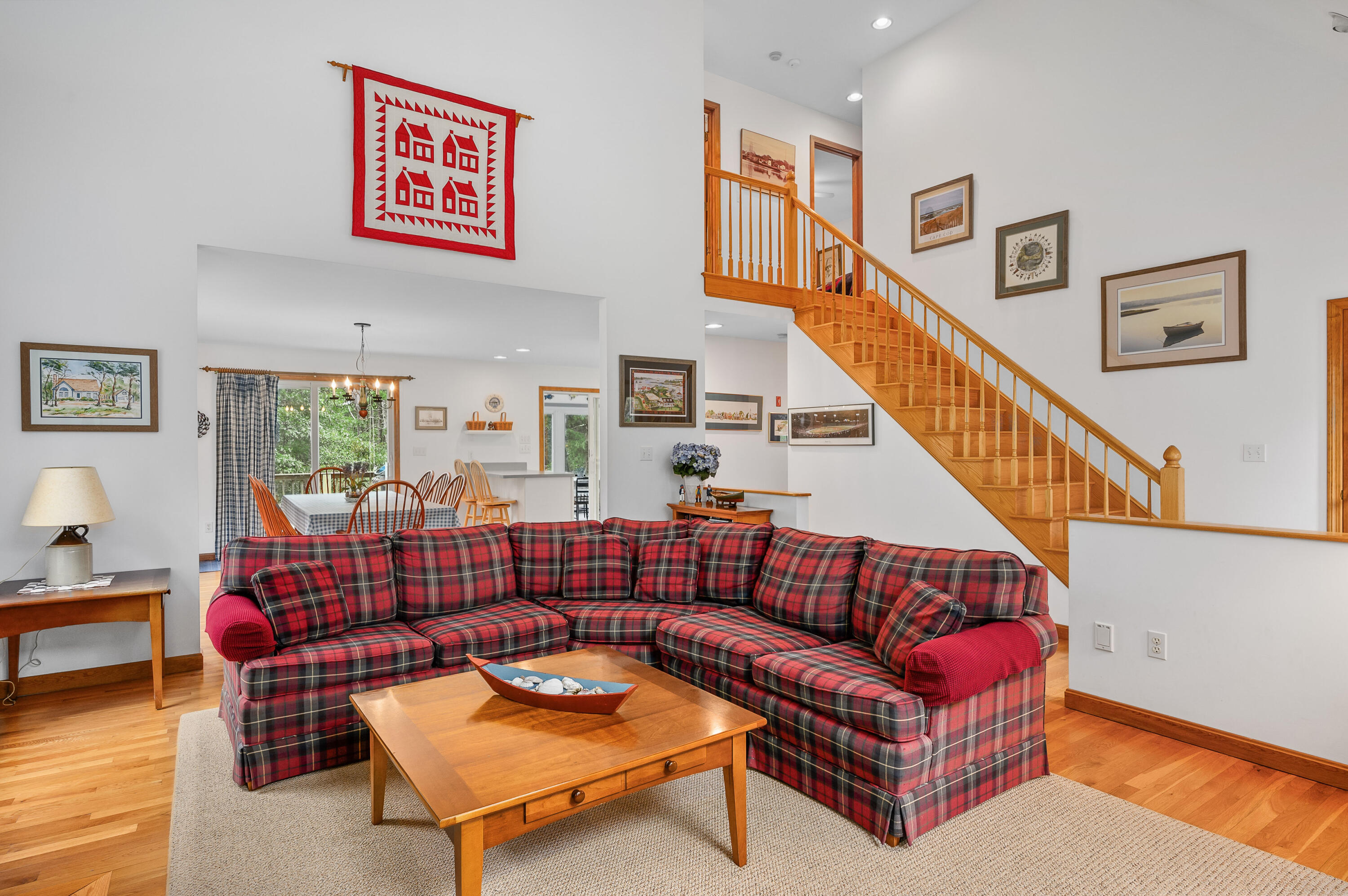 86 Old Wharf Road Wellfleet, MA 02667 - Photo 7 of 37 a living room with furniture a rug and a window
