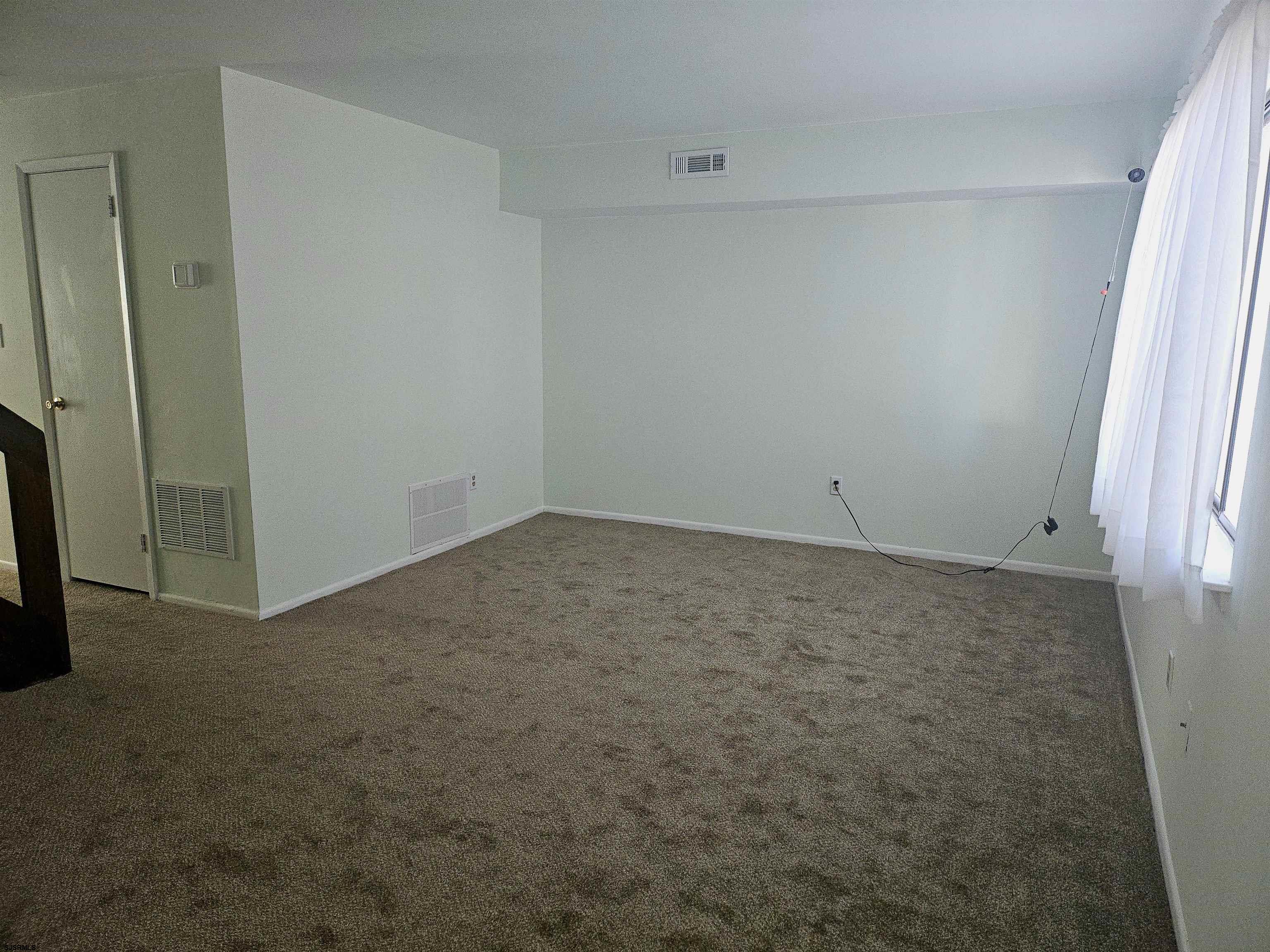 2127 Rhododendron Court, Unit 25 Mays Landing, NJ 08330 - Photo 3 of 15 an empty room with an entryway