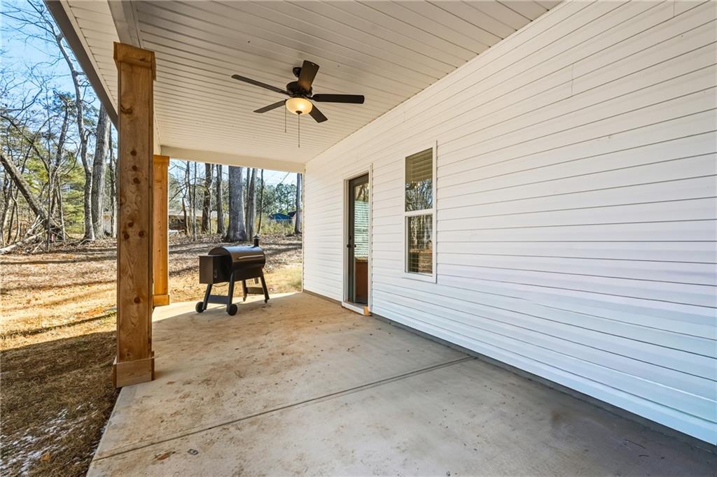 3462 Vinson Mountain Road Rockmart, GA 30153 - Photo 22 of 31 a view of livingroom with furniture and ceiling fan