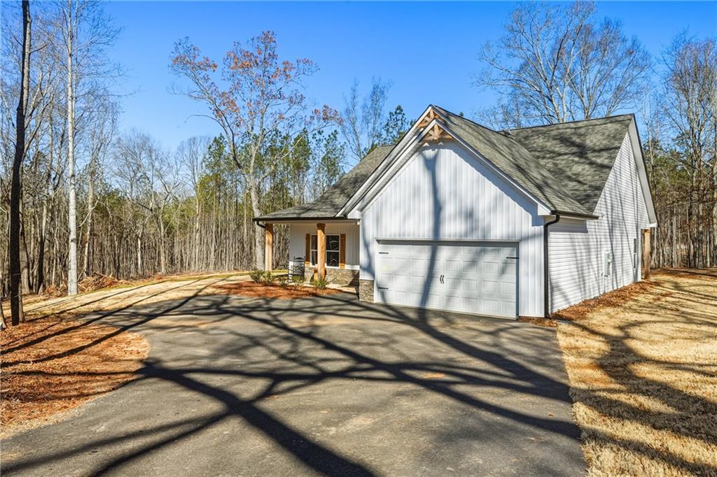 3462 Vinson Mountain Road Rockmart, GA 30153 - Photo 3 of 31 a view of backyard of house