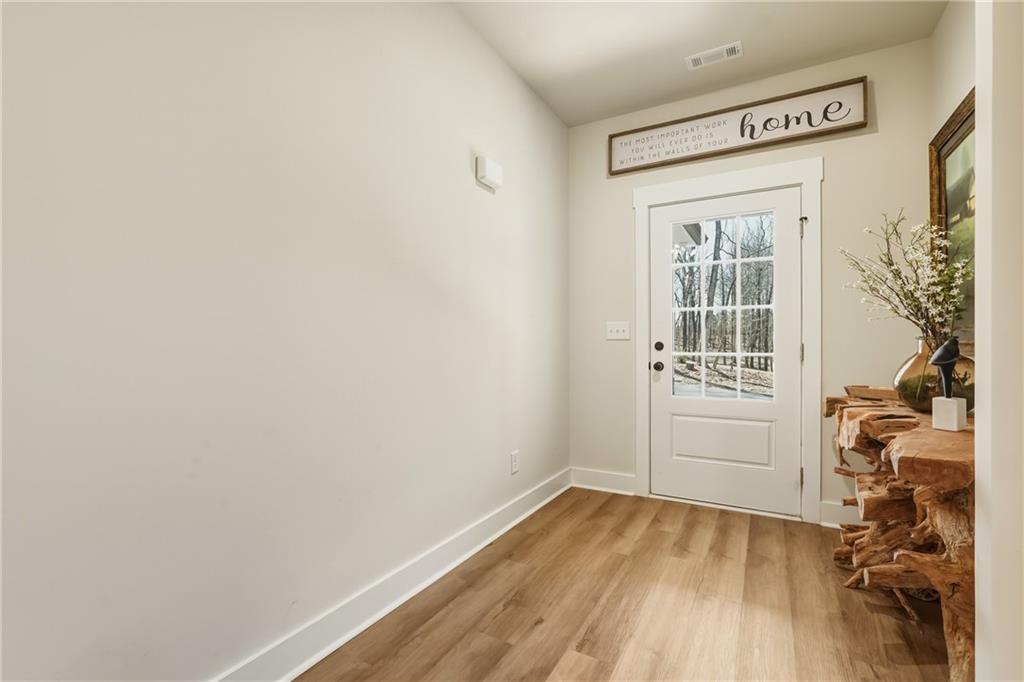 3462 Vinson Mountain Road Rockmart, GA 30153 - Photo 5 of 31 an empty room with windows