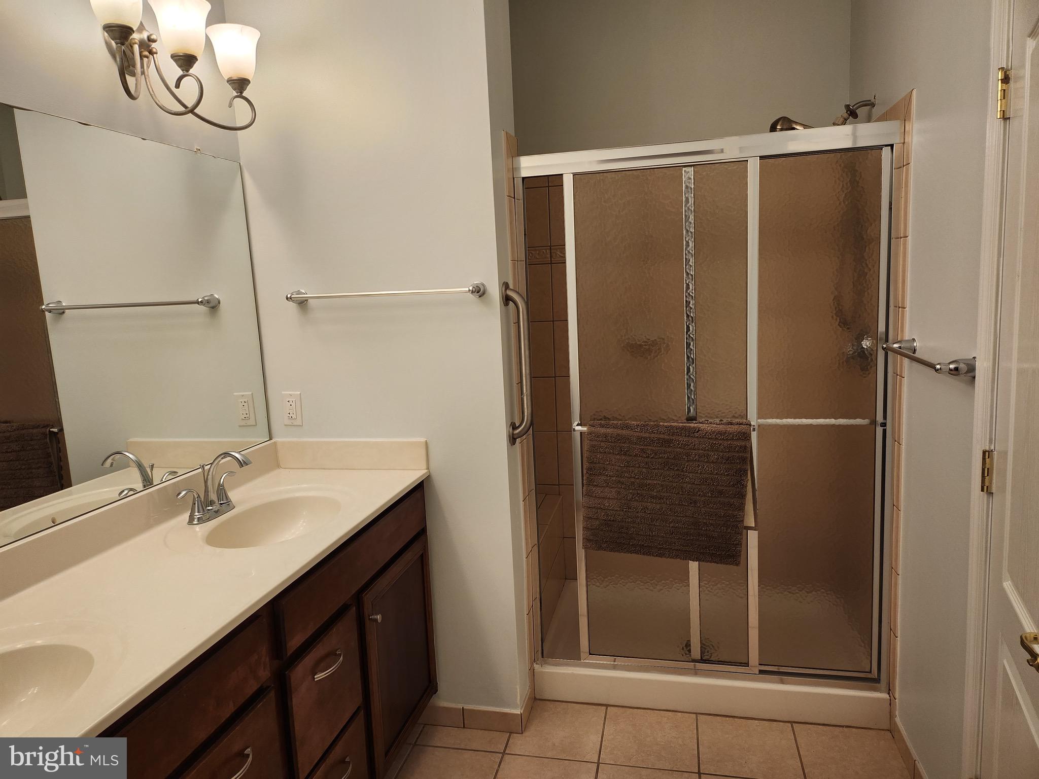 161 Stoyer Road Coatesville, PA 19320 - Photo 14 of 17 a bathroom with a sink and a mirror