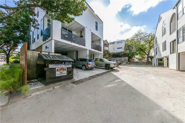 a view of a street with cars