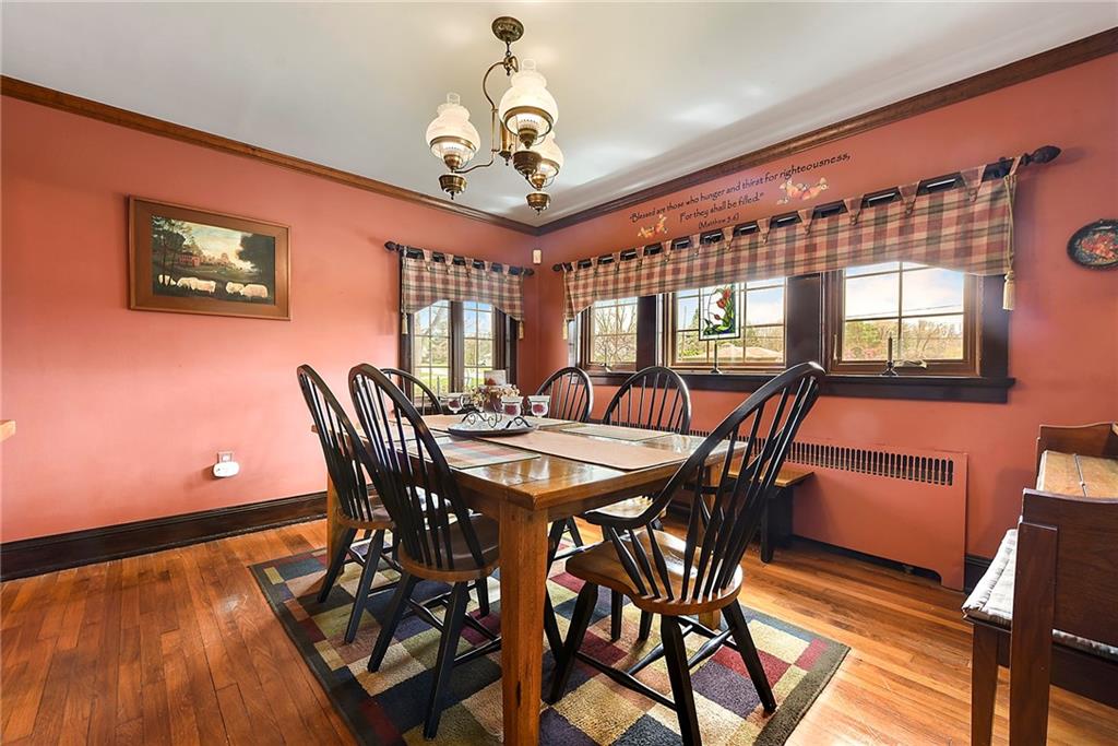 637 East McMurray Road Canonsburg, PA 15317 - Photo 12 of 50 a view of a dining room with furniture a chandelier and wooden floor