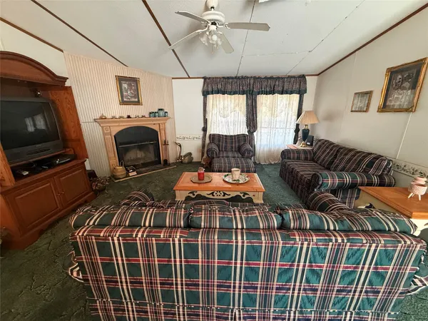 a bed room with a bed and a television