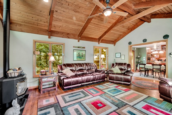 67 Chester Road Boxborough, MA 01719 - Photo 11 of 28 a living room with furniture and a wooden floor