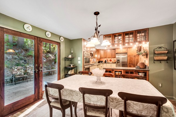 67 Chester Road Boxborough, MA 01719 - Photo 18 of 28 a view of a dining room with furniture window and outside view