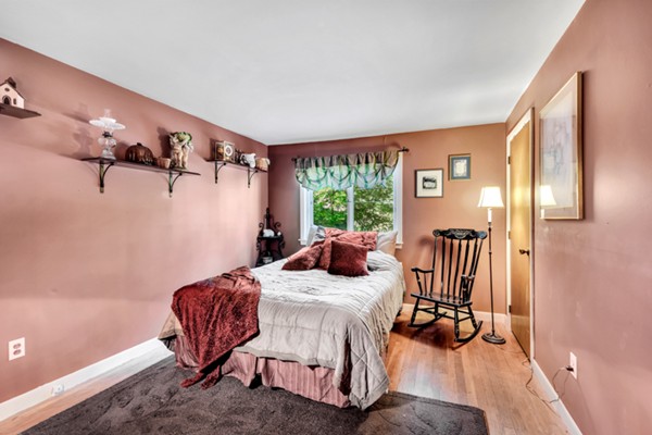 67 Chester Road Boxborough, MA 01719 - Photo 20 of 28 a bedroom with a bed and a table