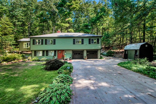 67 Chester Road Boxborough, MA 01719 - Photo 2 of 28 a front view of a house with a yard