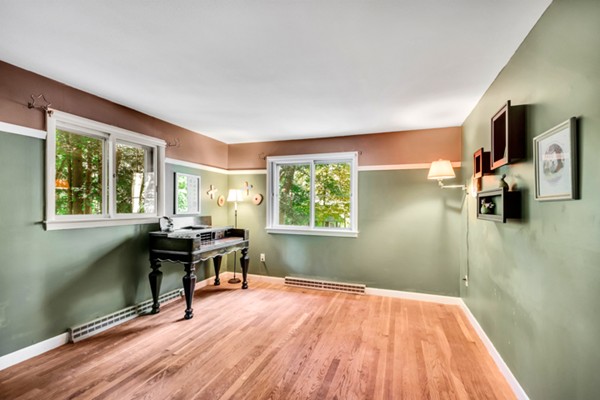 67 Chester Road Boxborough, MA 01719 - Photo 21 of 28 a view of a workspace with furniture and a window