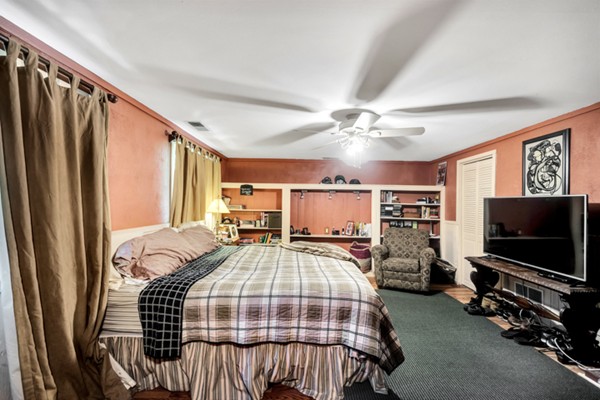 67 Chester Road Boxborough, MA 01719 - Photo 24 of 28 a bedroom with bed and a flat tv screen on dresser
