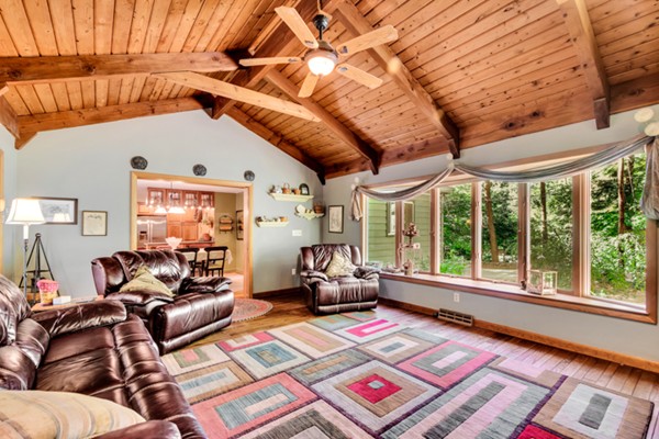 67 Chester Road Boxborough, MA 01719 - Photo 10 of 28 a living room with furniture and large windows