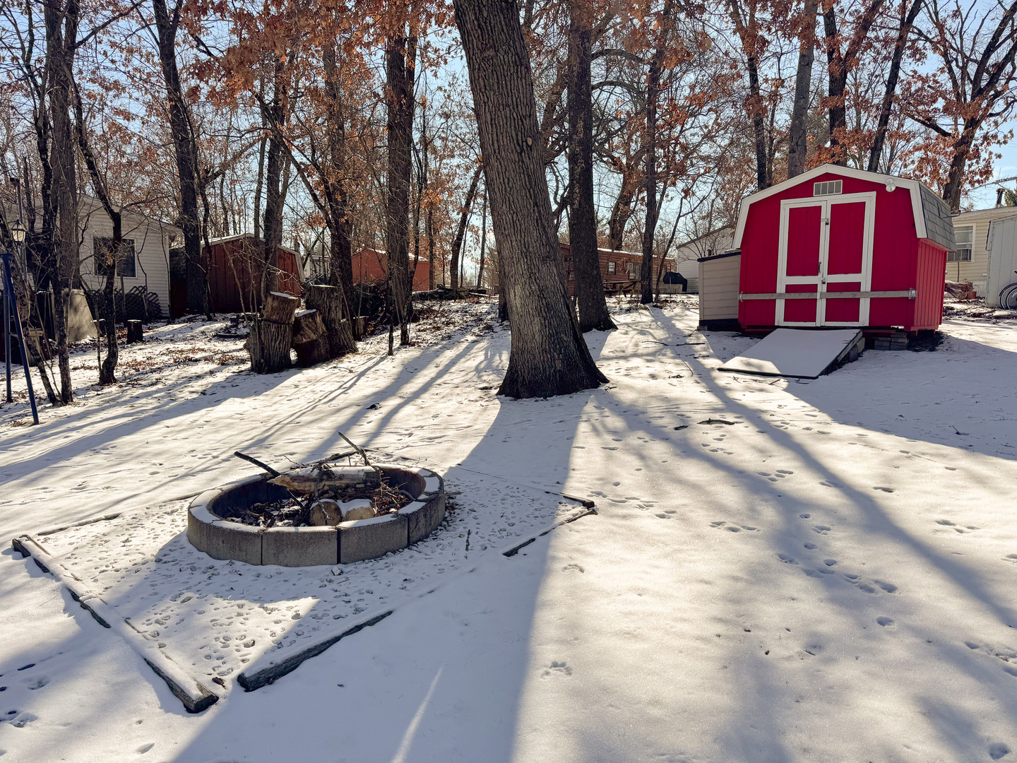 5-356 Woodhaven Sublette, IL 61367 - Photo 8 of 14 a view of a backyard with snow on the road