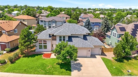 a aerial view of a house with garden
