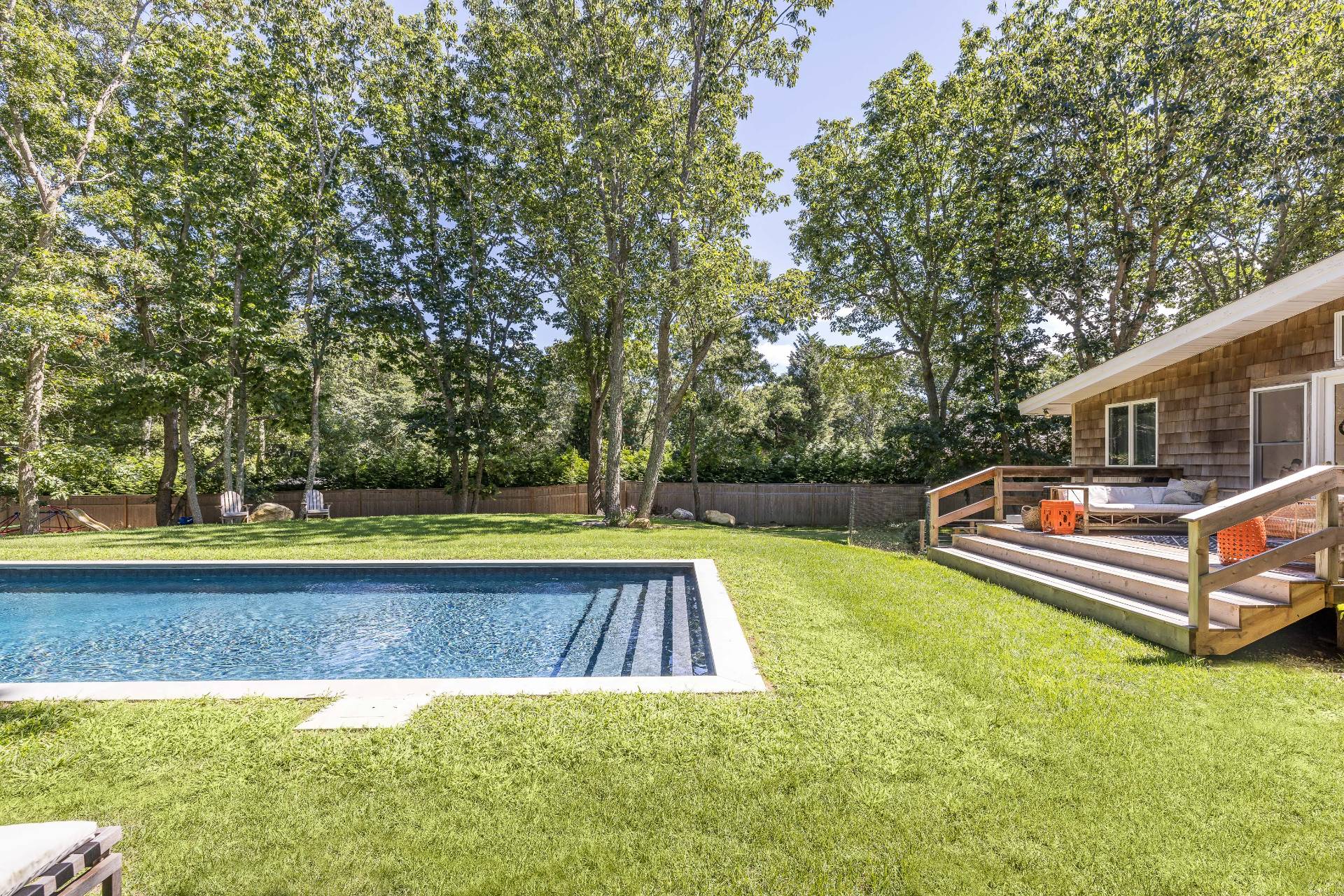 82 Springy Banks Road East Hampton, NY 11937 - Photo 17 of 21 a view of swimming pool with a yard