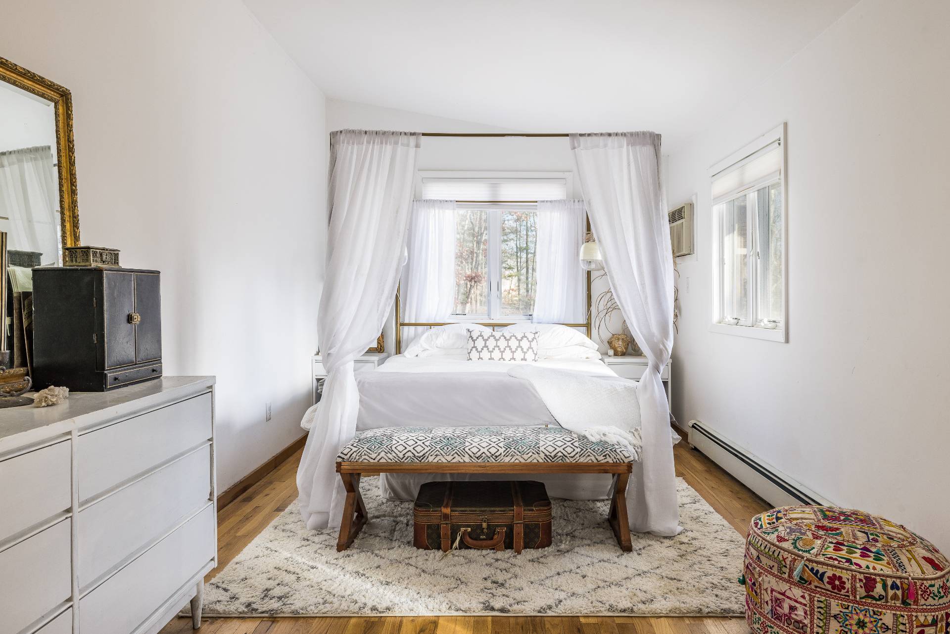 82 Springy Banks Road East Hampton, NY 11937 - Photo 6 of 21 a room with a bed and a fireplace