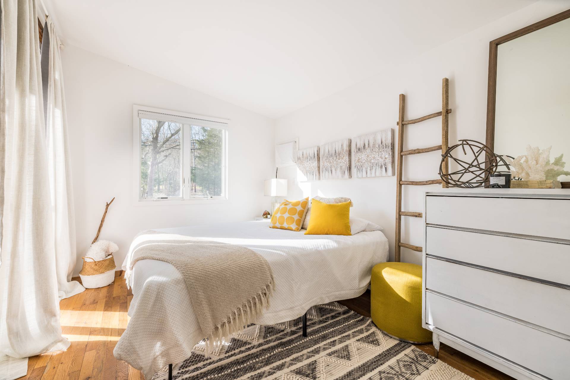 82 Springy Banks Road East Hampton, NY 11937 - Photo 8 of 21 a bedroom with a bed and a window