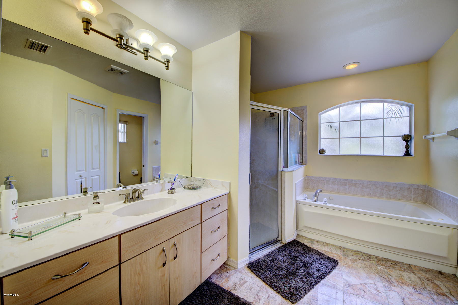 720 Furth Road Northwest Palm Bay, FL 32907 - Photo 18 of 24 Master Bath & Walk-in Shower