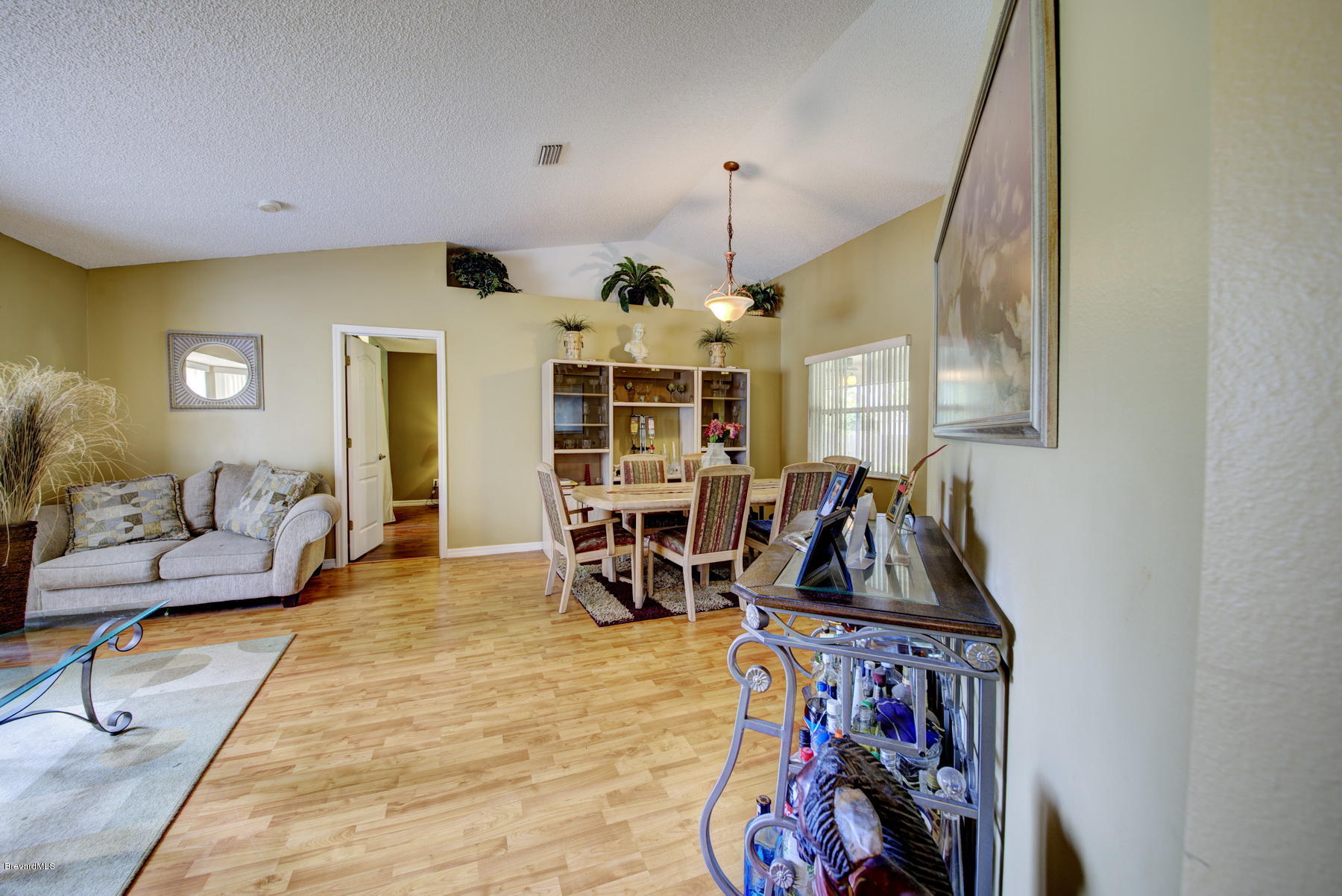 720 Furth Road Northwest Palm Bay, FL 32907 - Photo 5 of 24 Living & Dining Room