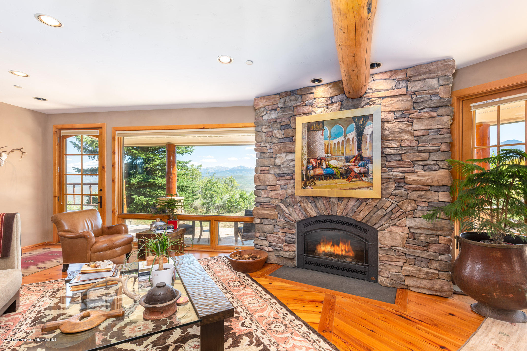 2000 Stone Road Basalt, CO 81621 - Photo 13 of 47 a living room with furniture and a fireplace