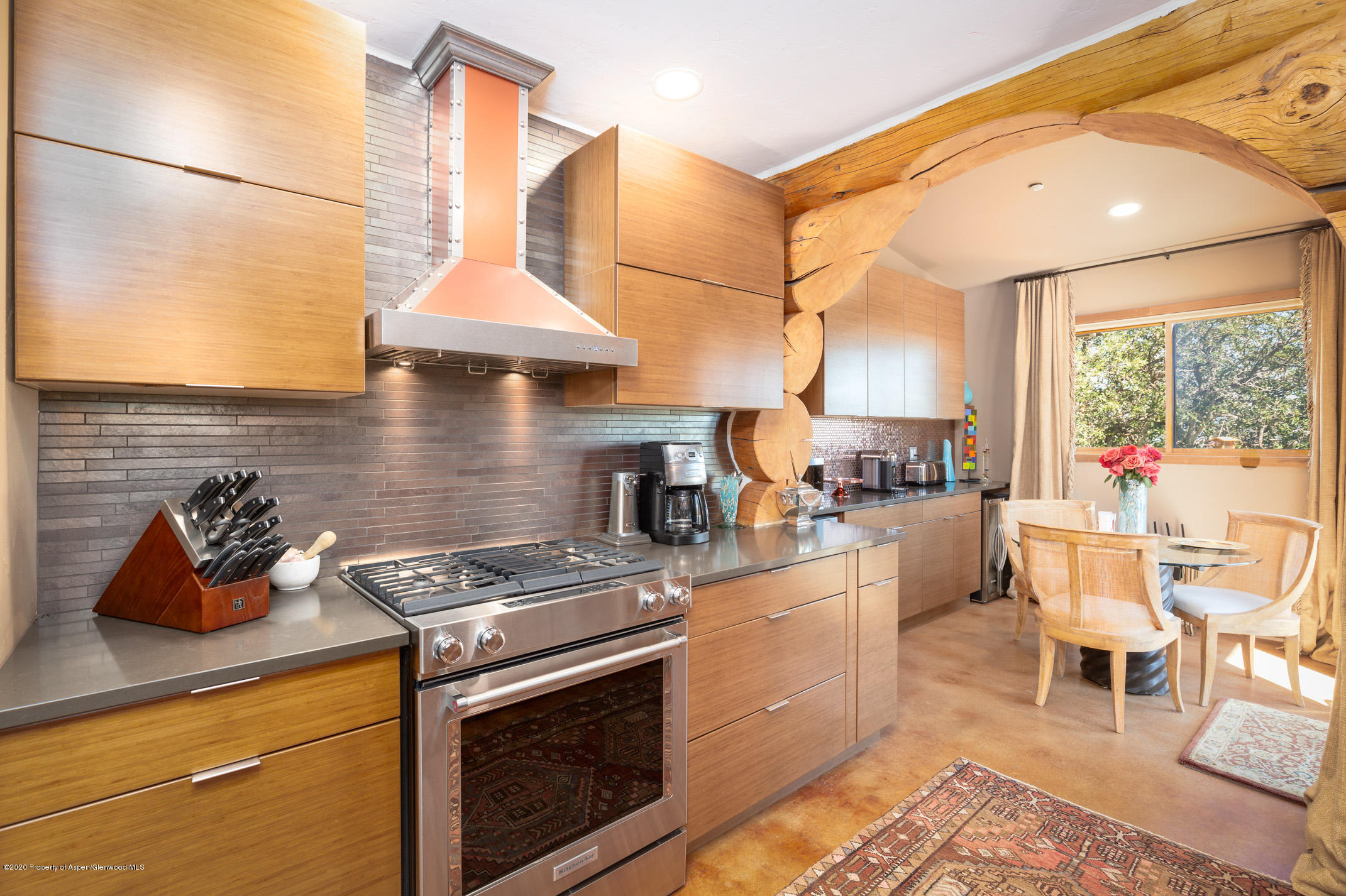 2000 Stone Road Basalt, CO 81621 - Photo 16 of 47 a kitchen with a stove and white cabinets