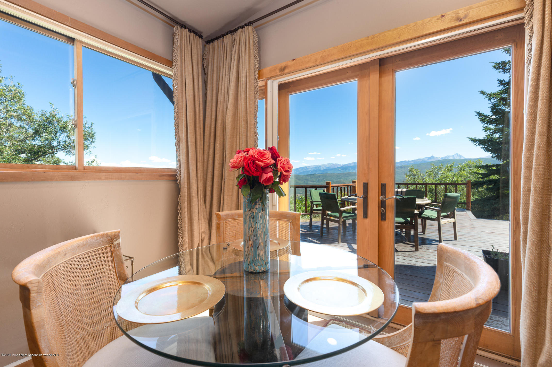 2000 Stone Road Basalt, CO 81621 - Photo 17 of 47 a dining room with furniture and wooden floor