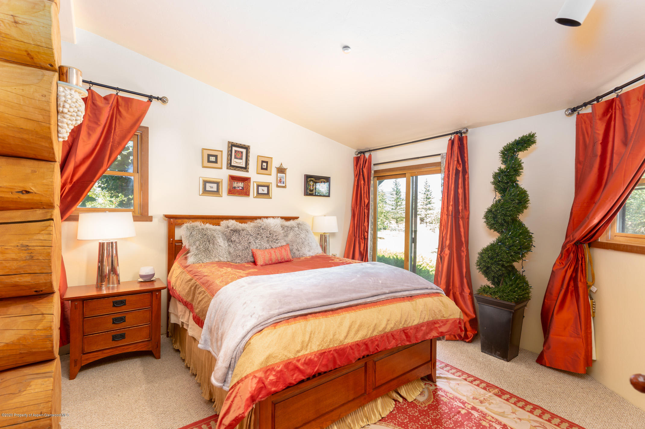 2000 Stone Road Basalt, CO 81621 - Photo 22 of 47 a bedroom with a bed and a painting on the wall