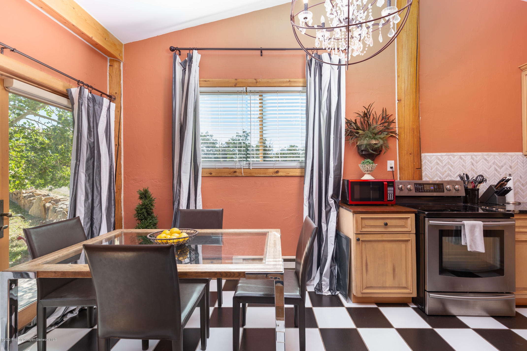 2000 Stone Road Basalt, CO 81621 - Photo 24 of 47 a view of a dining room with furniture window and outside view