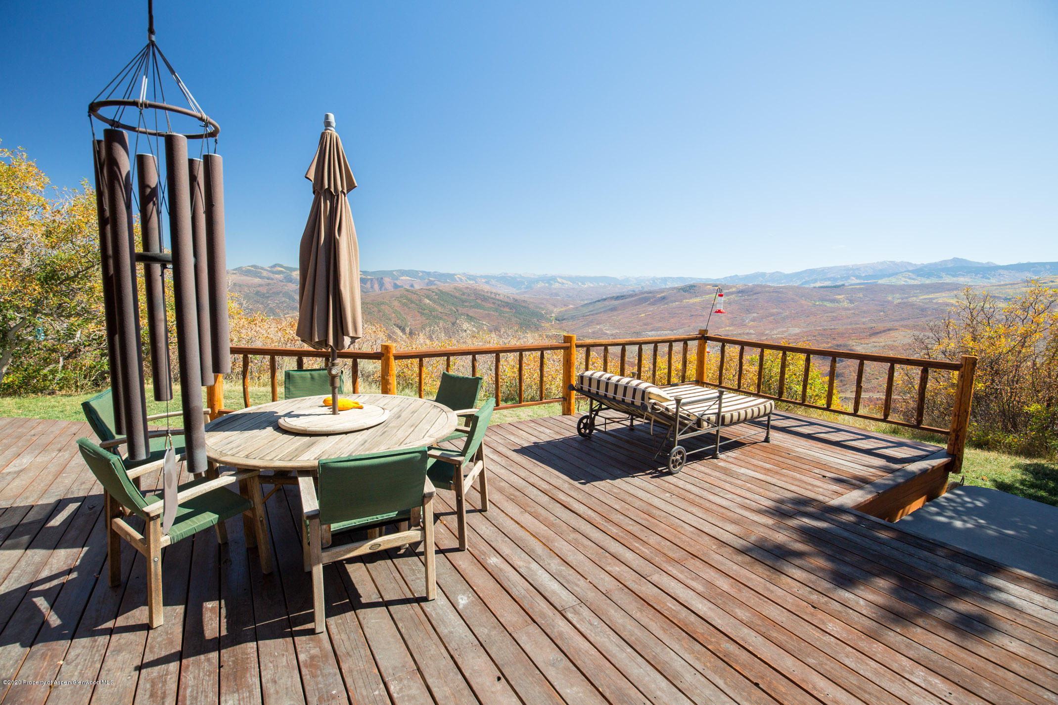 2000 Stone Road Basalt, CO 81621 - Photo 28 of 47 a view of a balcony with furniture and wooden floor