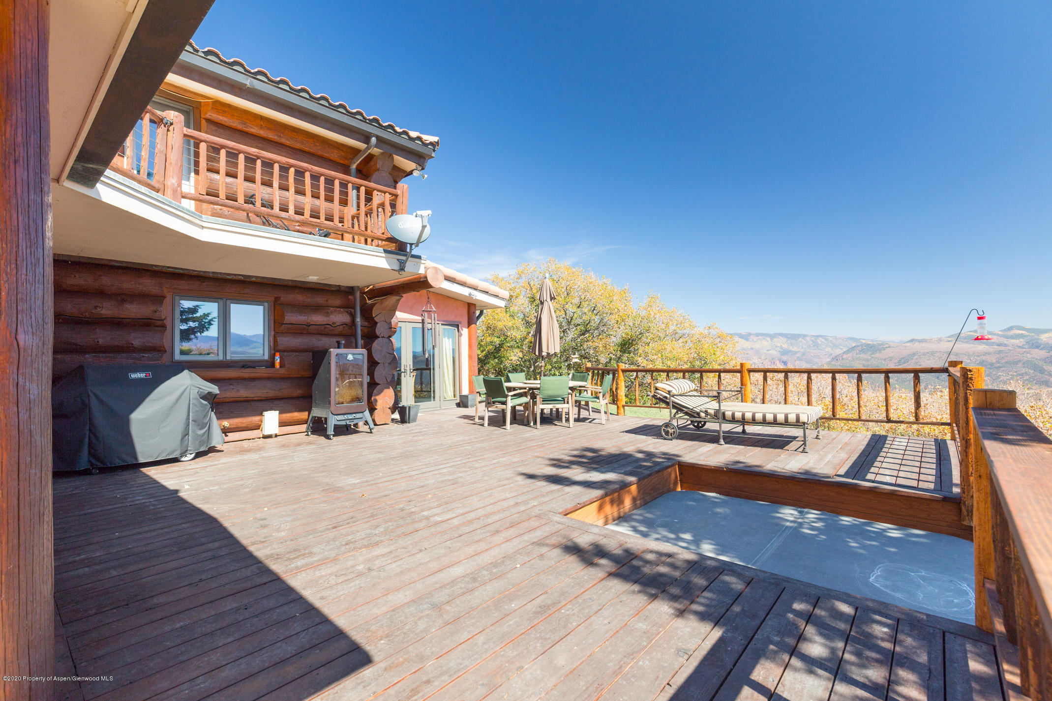 2000 Stone Road Basalt, CO 81621 - Photo 29 of 47 a view of a patio with swimming pool table and chairs