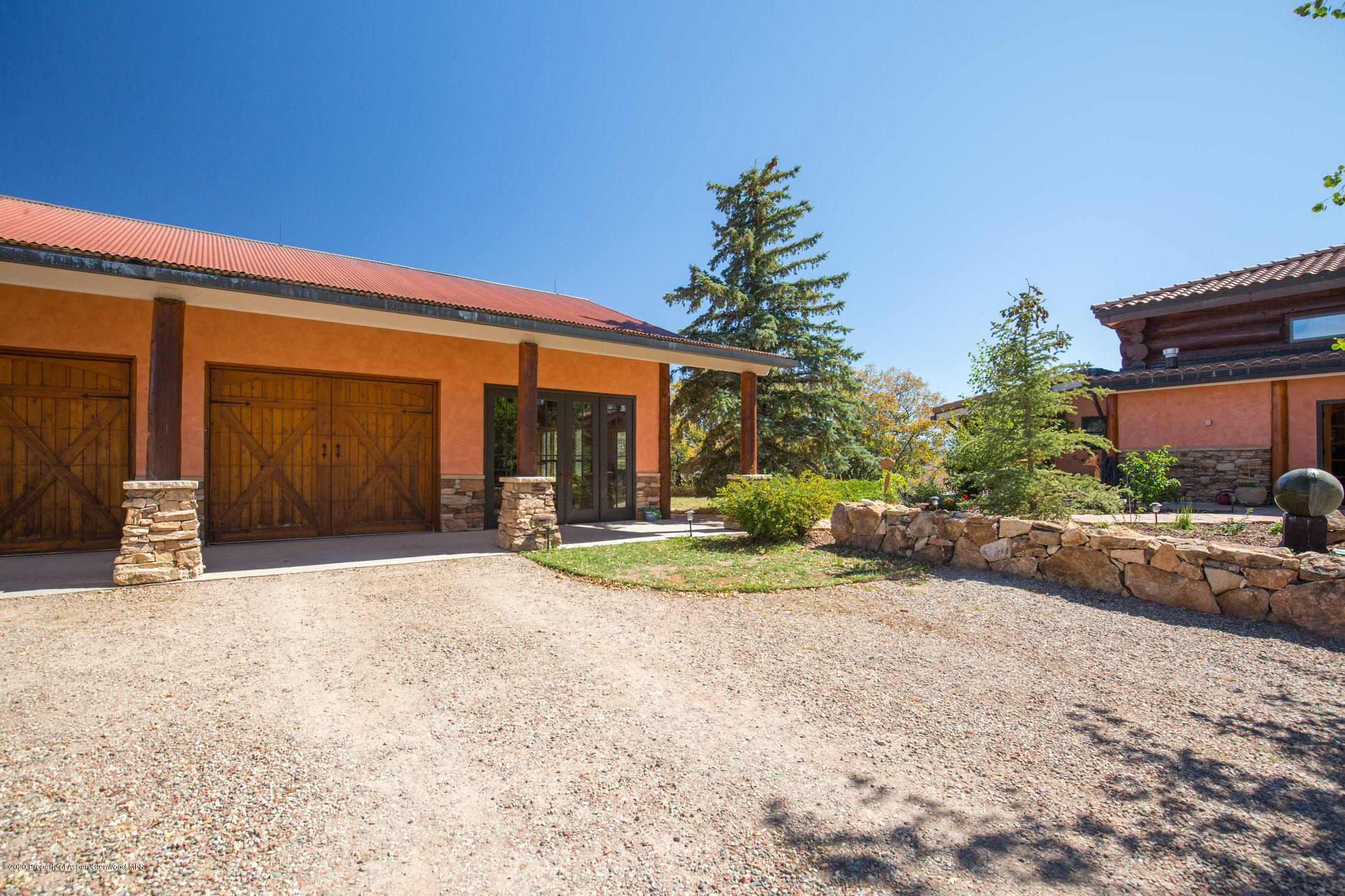 2000 Stone Road Basalt, CO 81621 - Photo 37 of 47 a view of a house with backyard and a garage