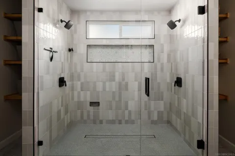 a bathroom with a double vanity sink mirror and shower