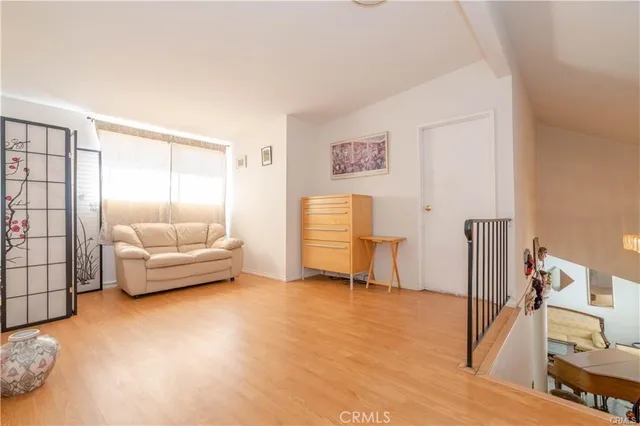 a bedroom with a bed and a table in it