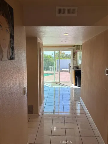 a hallway with a large window