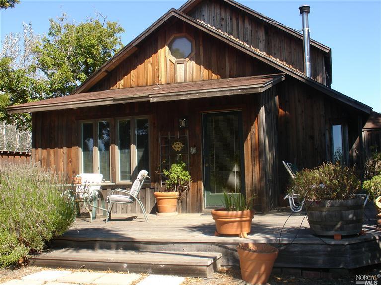 34470 Annapolis Road Annapolis, CA 95412 - Photo 1 of 1 a view of house with outdoor seating space