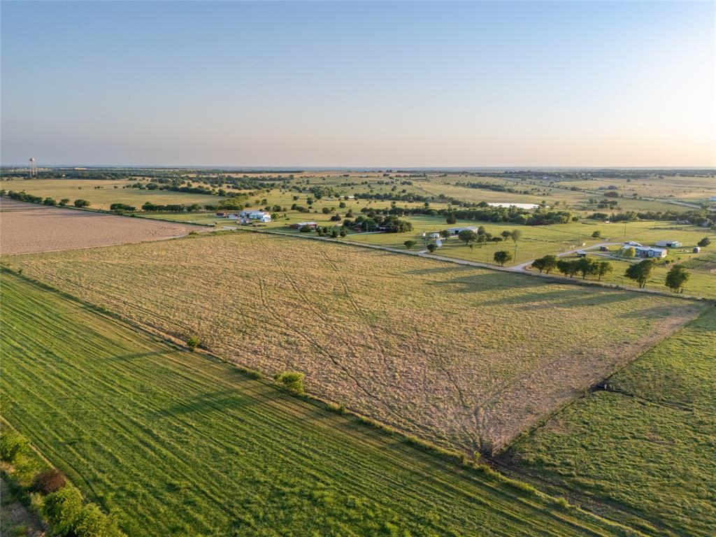 12370 Fortenberry Road Sanger, TX 76266 - Photo 33 of 40 Aerial view of property and surrounding area featuring rural landscape and large plots for crops