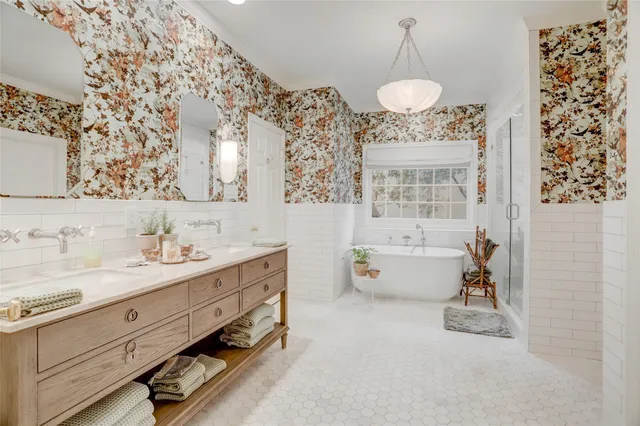a white bath tub sitting next to a window
