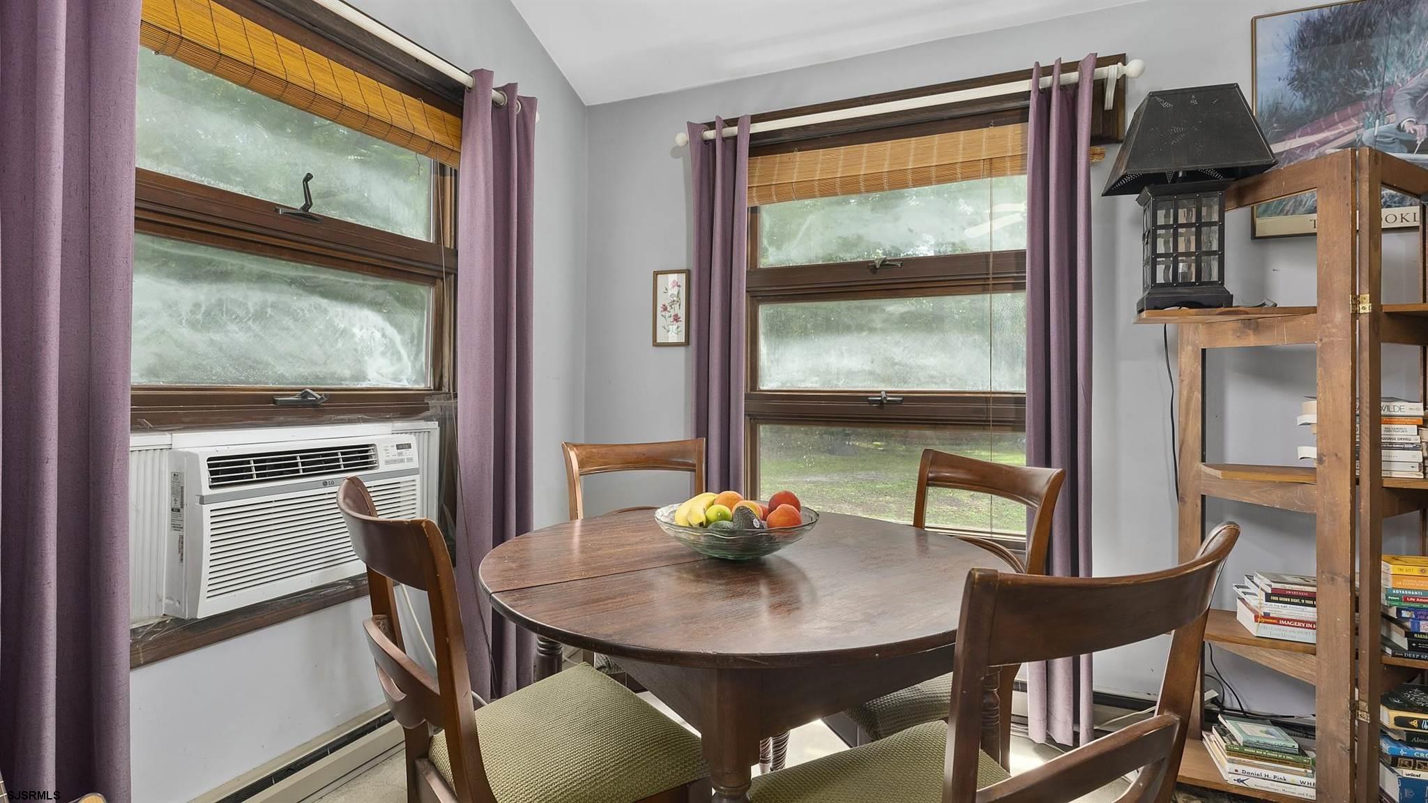 26 Indian Walk Road Ocean View, NJ 08230 - Photo 11 of 27 a view of a dining room with furniture window and outside view