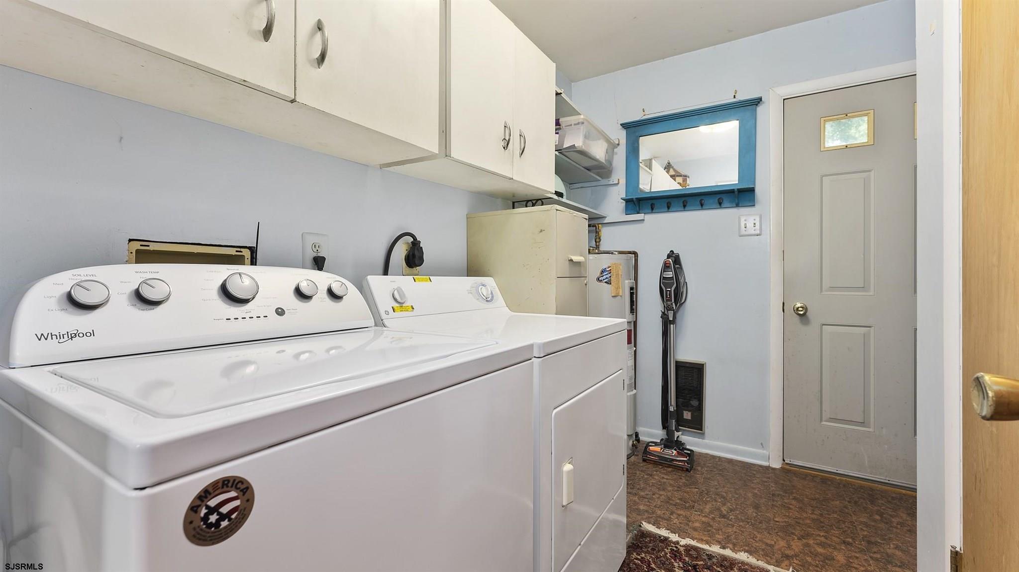 26 Indian Walk Road Ocean View, NJ 08230 - Photo 17 of 27 a utility room with dryer and washer